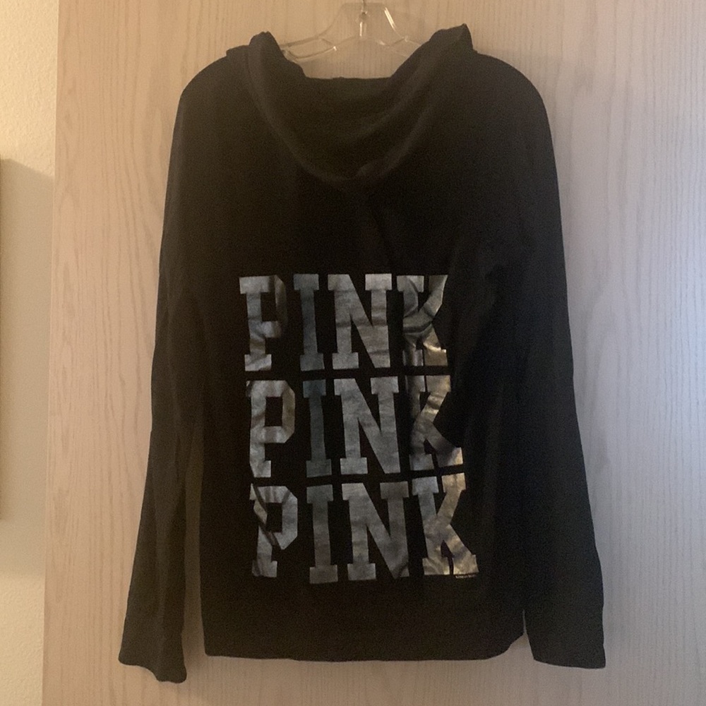 Pink hoodie in black, size large
